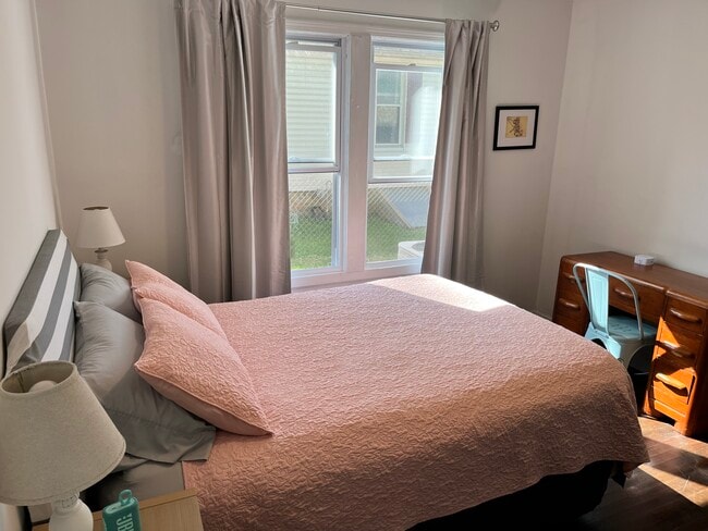 Bedroom with full bed, dresser, desk and closet - 711 Hamilton St Unit 2