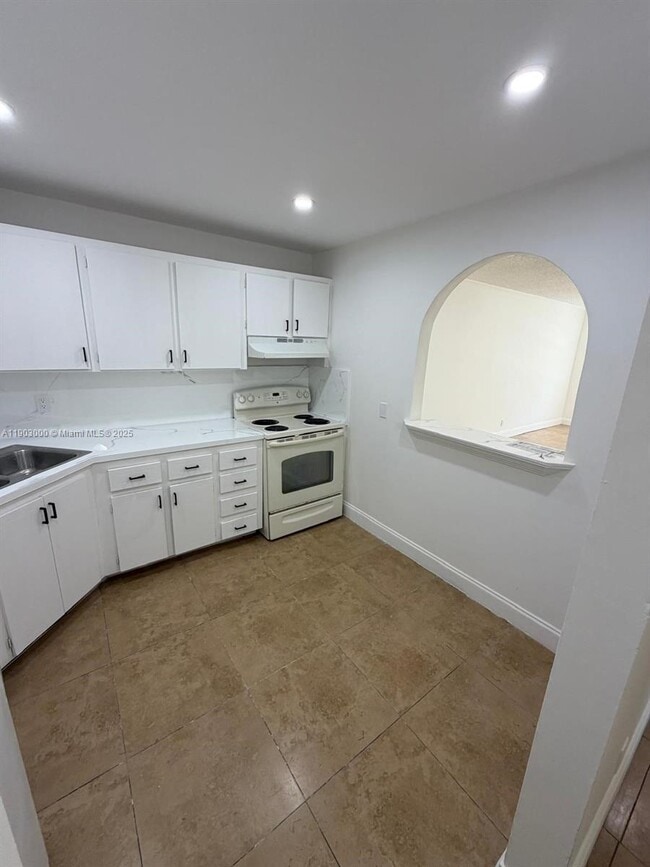 Photo - 10701 Royal Palm Blvd Unit 14