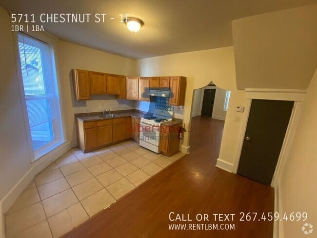 Building Photo - 5711 Chestnut St Unit 1F Rental