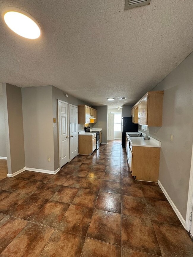 Photo - 3 Bed / 2 Bath off of South Caraway Available Now