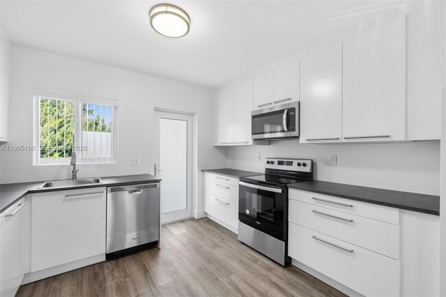 Building Photo - 600 Layne Blvd Unit 126