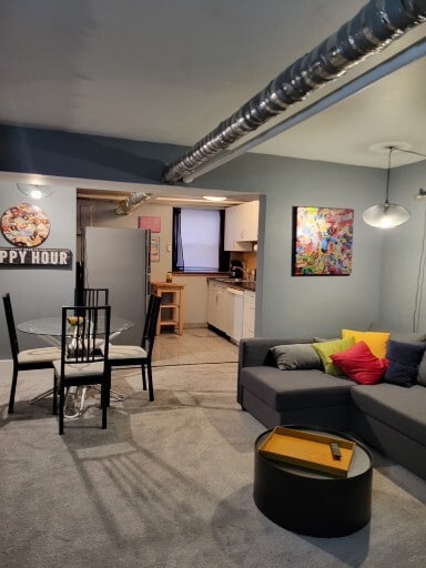 B1 Living & Dining Area - The Commodore Apartments