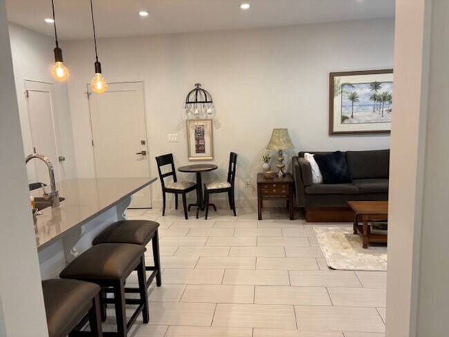 Photo - 2-bedroom 1 bath garage apartment with a garage parking space!!