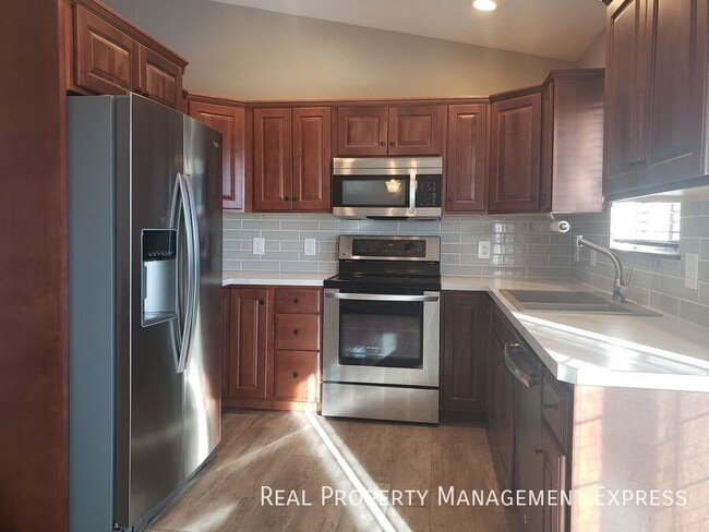 Photo - Lovely 4 Bed 2 Bath Home with a Huge Deck and Massive Fenced-in Yard