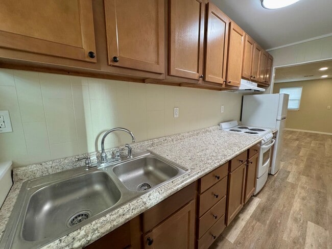 Photo - Updated 1-brm home - huge living room, brand new flooring, washer/dryer, new kitchen, new bathroo...