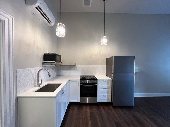 Photo - Modern Living with a Touch of Historic Charm Unit 203