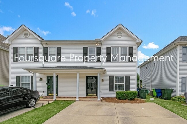 Building Photo - Spacious 3-Bed, 2.5-Bath Townhome with Fir...