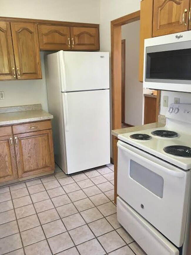 Photo - Perfect location 3 bed 2 bath with fenced in back yard and two car garage!