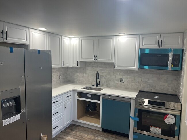 New kitchen Appliances, Cabinets and Quartz Countertops - 1 Abbott Rd Condo Unit 46