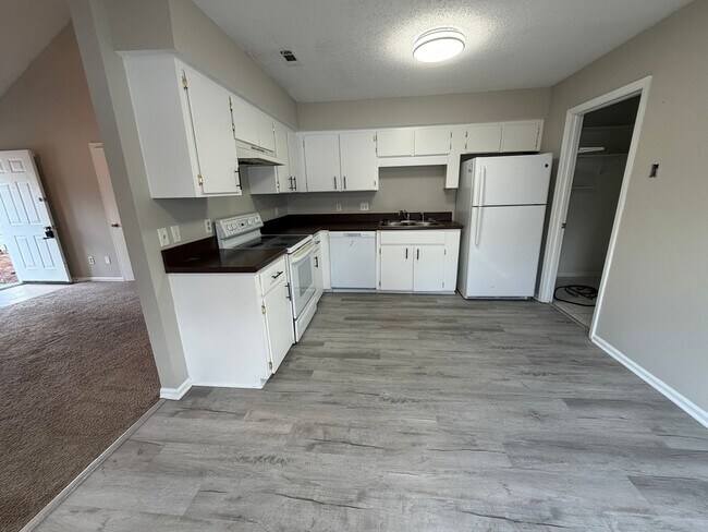 Photo - Ridgewood Subdivision Gem: 3-Bedroom Home with Fenced Yard.