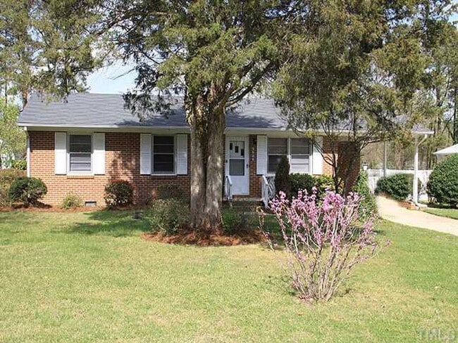 Photo - Outdoor Living Dream: Ranch-style home wit...