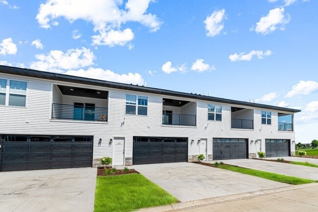 Photo - New 3 Bed Townhome with Covered Deck and Oversized Garage!