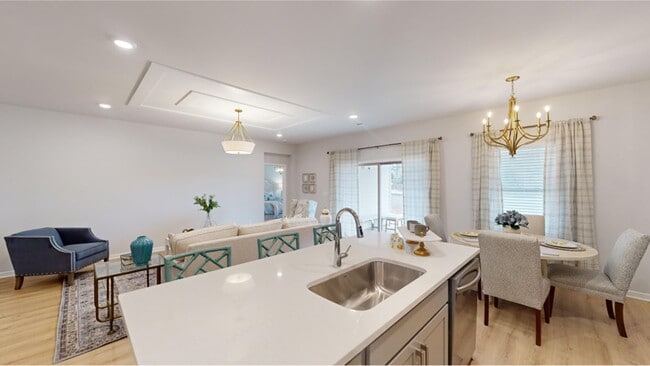 The center island has an open line of sight to the Great Room and caf´e - 15580 Ruthie Lynn Dr Unit A