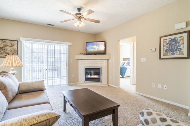 Our spacious floor plans include ceiling fans and ample natural lighting. - Ridge Pointe Villas Apartments