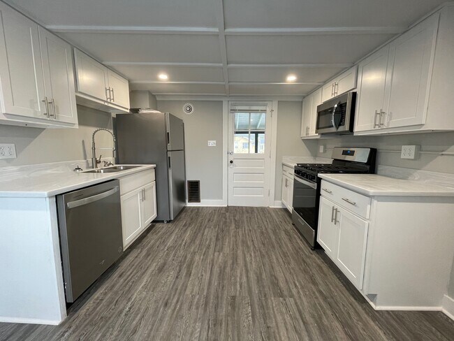 full view of kitchen (door is the entrance) - 50 N Main St Townhome