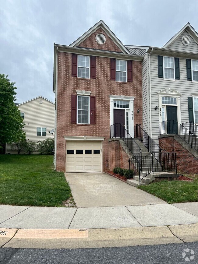 Building Photo - End-Unit Garage Townhome