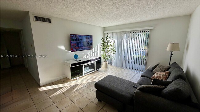 Building Photo - 7210 NW 179th St Unit 206