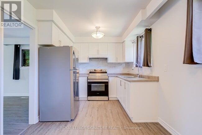 Photo - 141 Oakmeadow Blvd