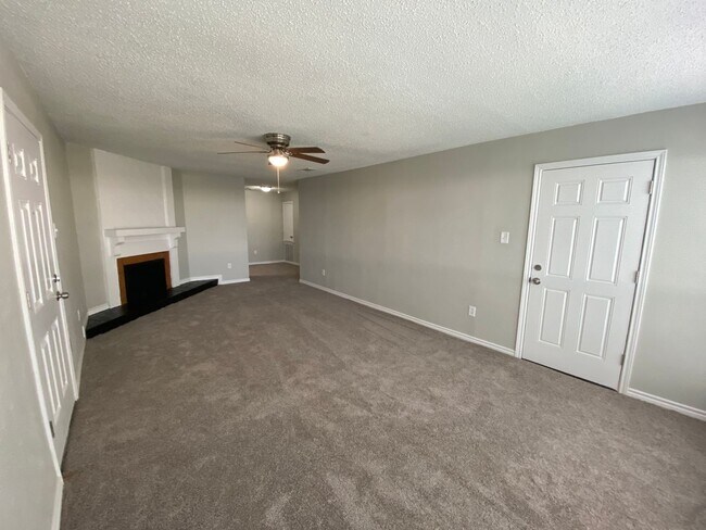 Photo - Charming Unit with Vaulted Ceilings & Fire...