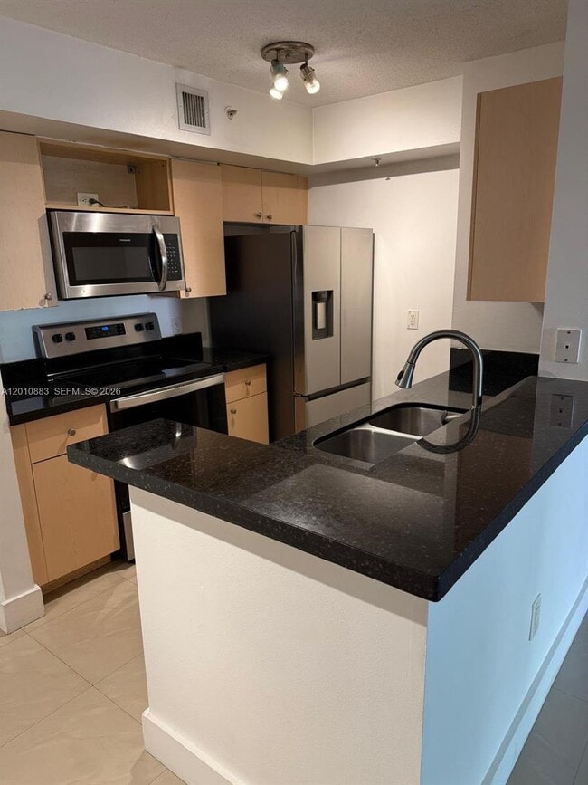 Building Photo - 2433 Centergate Dr Unit 107