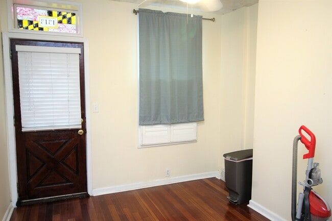 Photo - Charming Locust Point 2bd+Den/1ba Rowhome w/ W/D, CAC and One-Car garage! Available 7/15!