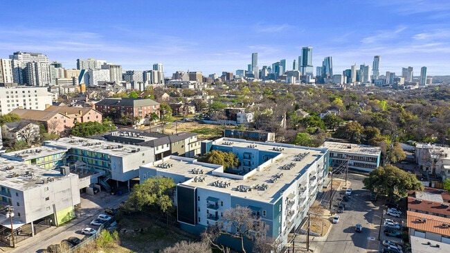 24-Longview-Apartments-Near-UT-Austin-Aerial-of-Community-and-Austin-Skyline - 24 Longview
