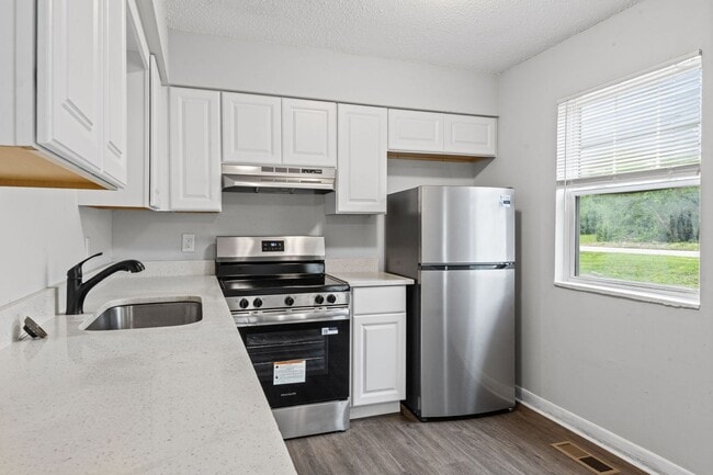 Building Photo - Summer Special! Spacious 3BR Townhome with New Upgrades + $250 Off First Month’s Rent