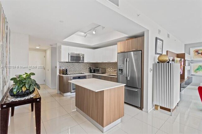 Building Photo - 5300 Paseo Blvd Unit 5300 Paseo Blvd  502 Rental