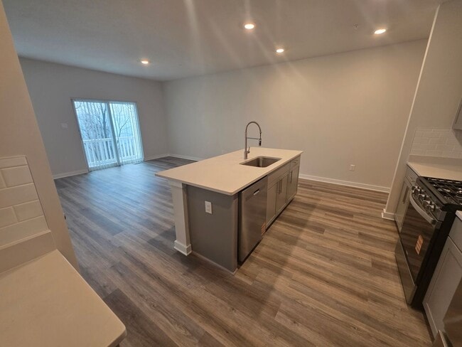 Photo - Luxury 4-Bedroom Townhome with Finished Walkout Basement & River Views