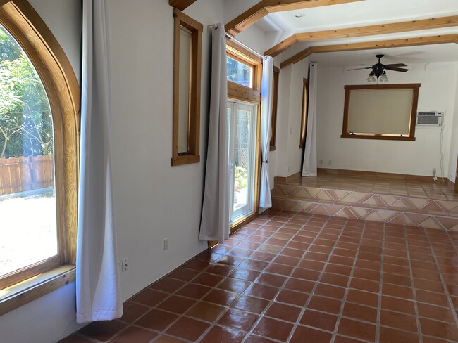 Step up area for bedroom. Was alter for chapel. - 6206 Temple Hill Dr Unit Lower