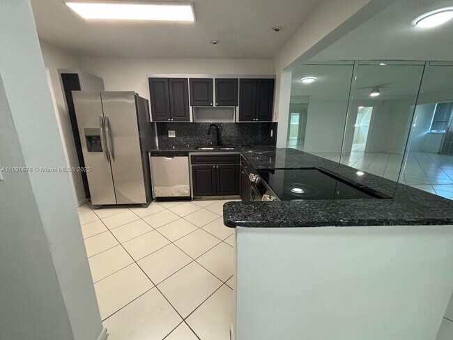Photo - 215 SE 3rd Ave Unidad 107A