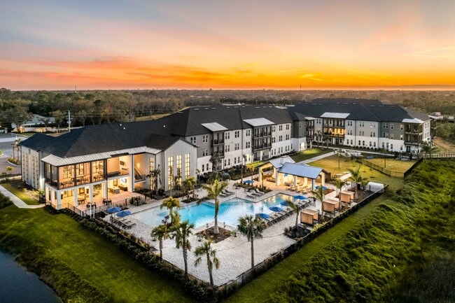 Building Photo - The Crossing at Palm Aire Rental