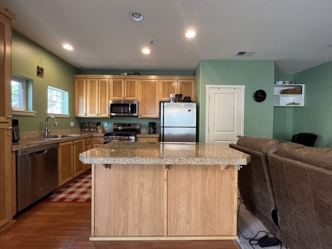 Photo - Well-Designed Condo with Dual Primary Suites, Vaulted Ceilings & Community Clubhouse