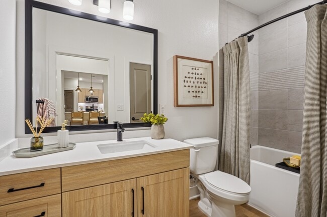 Bathroom with Quartz Countertop and Soaking Tub - The Sylvan at Painted Tree