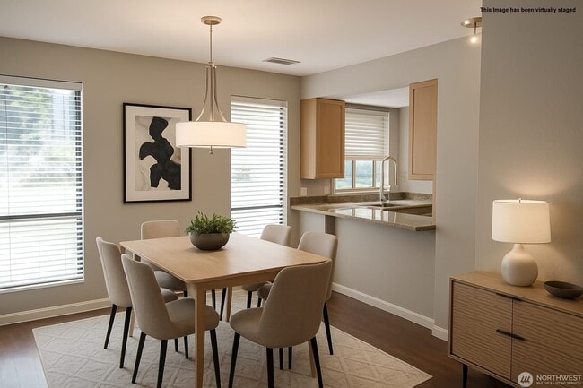 Virtually staged Dining Room - 10819 NE 37th Pl Unit #107