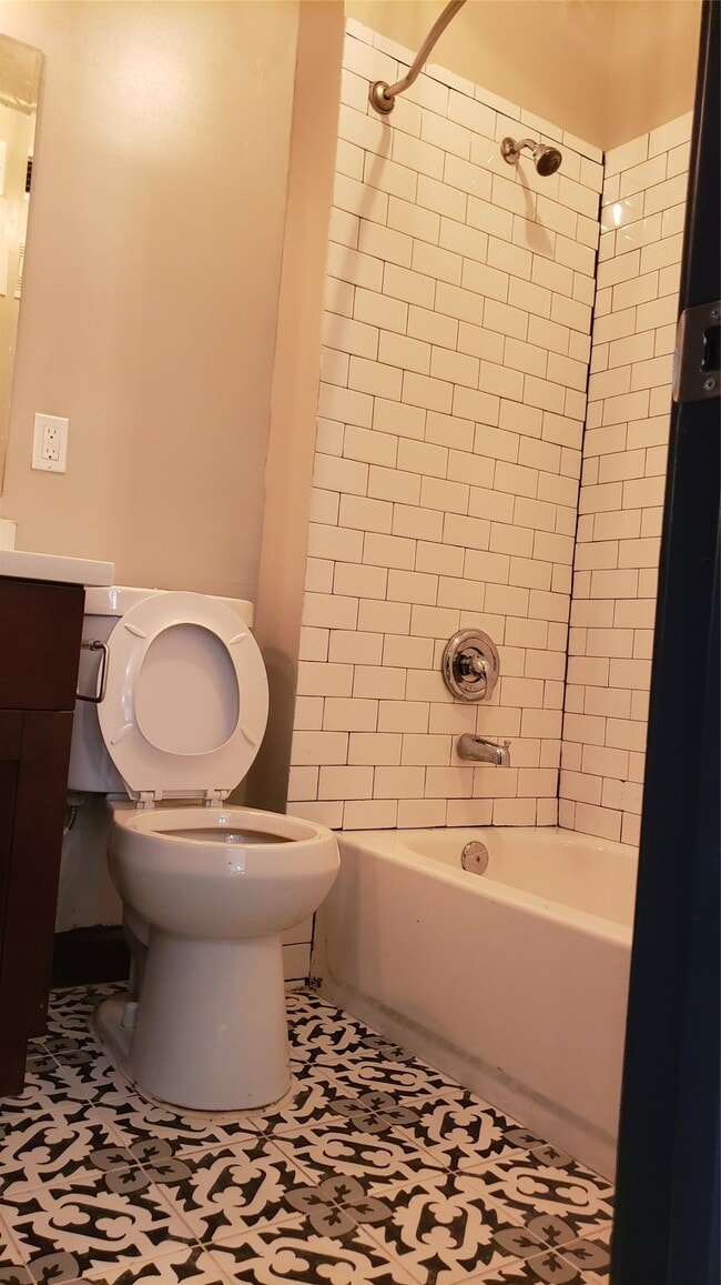 Building Photo - 6819 Avenue C Unit A