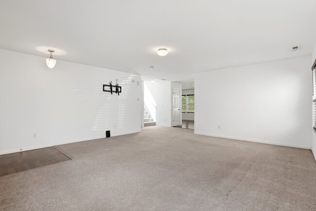 Photo - Spacious 4BR Home with New Carpet & Fenced Backyard