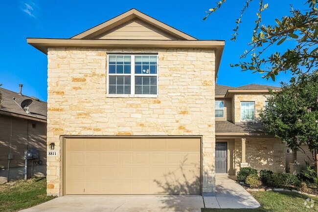 Building Photo - 8811 Mustang Pass Rental
