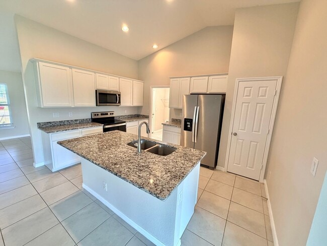 Photo - 4 Bed, 2 Bath Available Now in NW Cape Coral