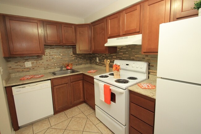 Cocina de la Unidad C - Apartments at Logan Station