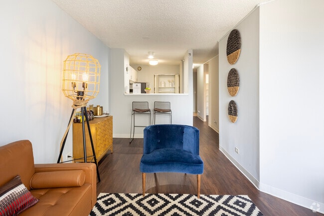 1BR, 1BA - 700SF Living Room - Lake Shore Plaza