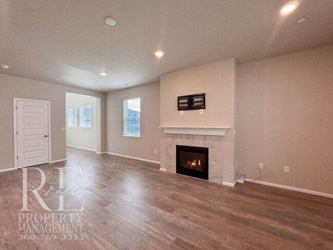 Photo - Warm & Inviting 4-Bedroom Home with Vaulted Ceilings, Loft, Fireplace & Fenced Backyard