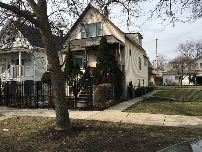 Building Photo - 4610 N Karlov Ave Unit 1