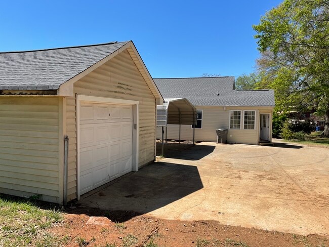 Garage and 2 car carport - 205 N Beacon St