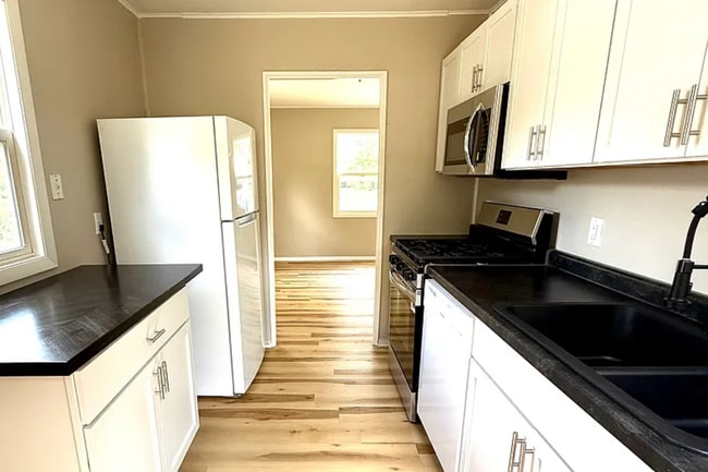 Photo - Sun-Filled 2BR Home on Corner Lot with Spacious Garage