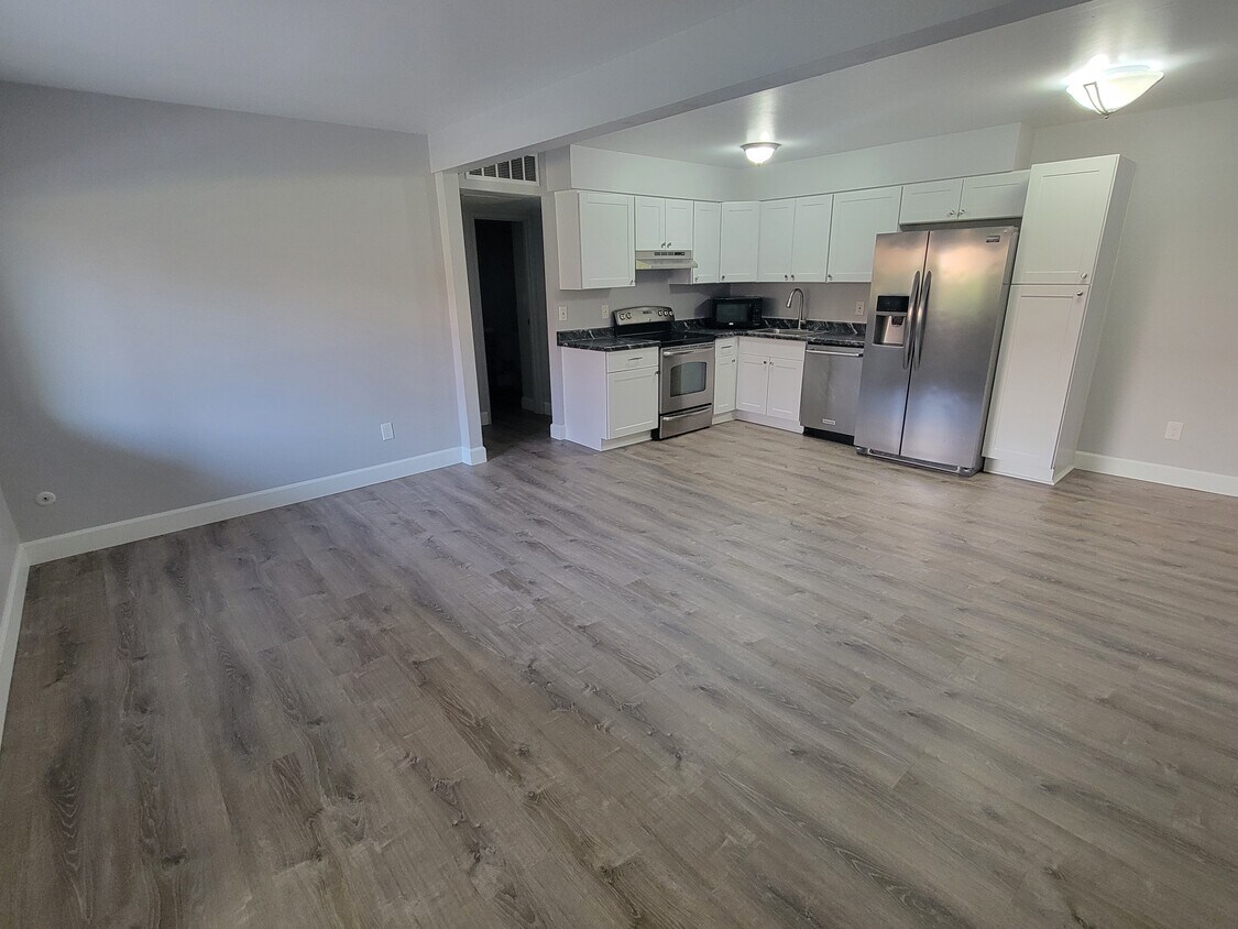 Living/Kitchen-brand new flooring and cabinets - 3663 S Sheridan Blvd (Denver, CO)
