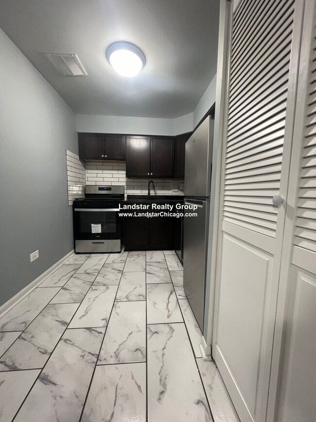 Building Photo - 1523 W Morse Ave Unit 1 Rental