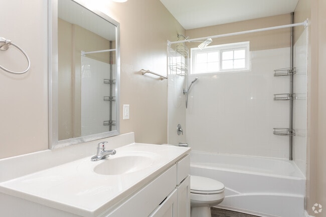 2BR, 1.5BA - 1050SF Renovated- Bathroom - Caswell at Riverwalk