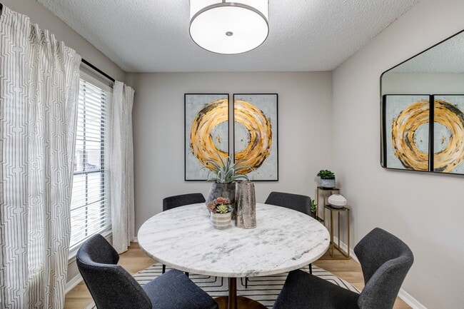 Charming Renovated Dining Area - Fox Trails Apartments