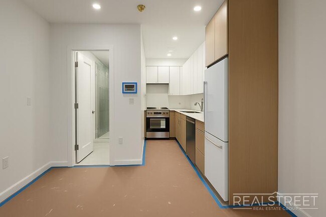 Photo - Stylish 1-Bedroom Apartment with Modern Amenities in Bed-Stuy